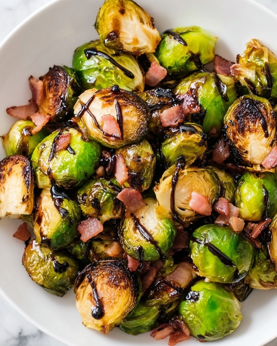A close-up dish of roasted Brussels sprouts with a mix of whole and halved green Brussels sprouts showing crisp, charred light brown edges and soft inner layers. Scattered among the Brussels sprouts are small, pinkish-brown cooked bacon pieces and a dark glossy balsamic glaze drizzled unevenly over the top. The food is served in a white bowl on a white marbled surface, highlighting the colors and textures of the roasted vegetables and bacon. photo taken with an iphone --ar 4:5 --v 7