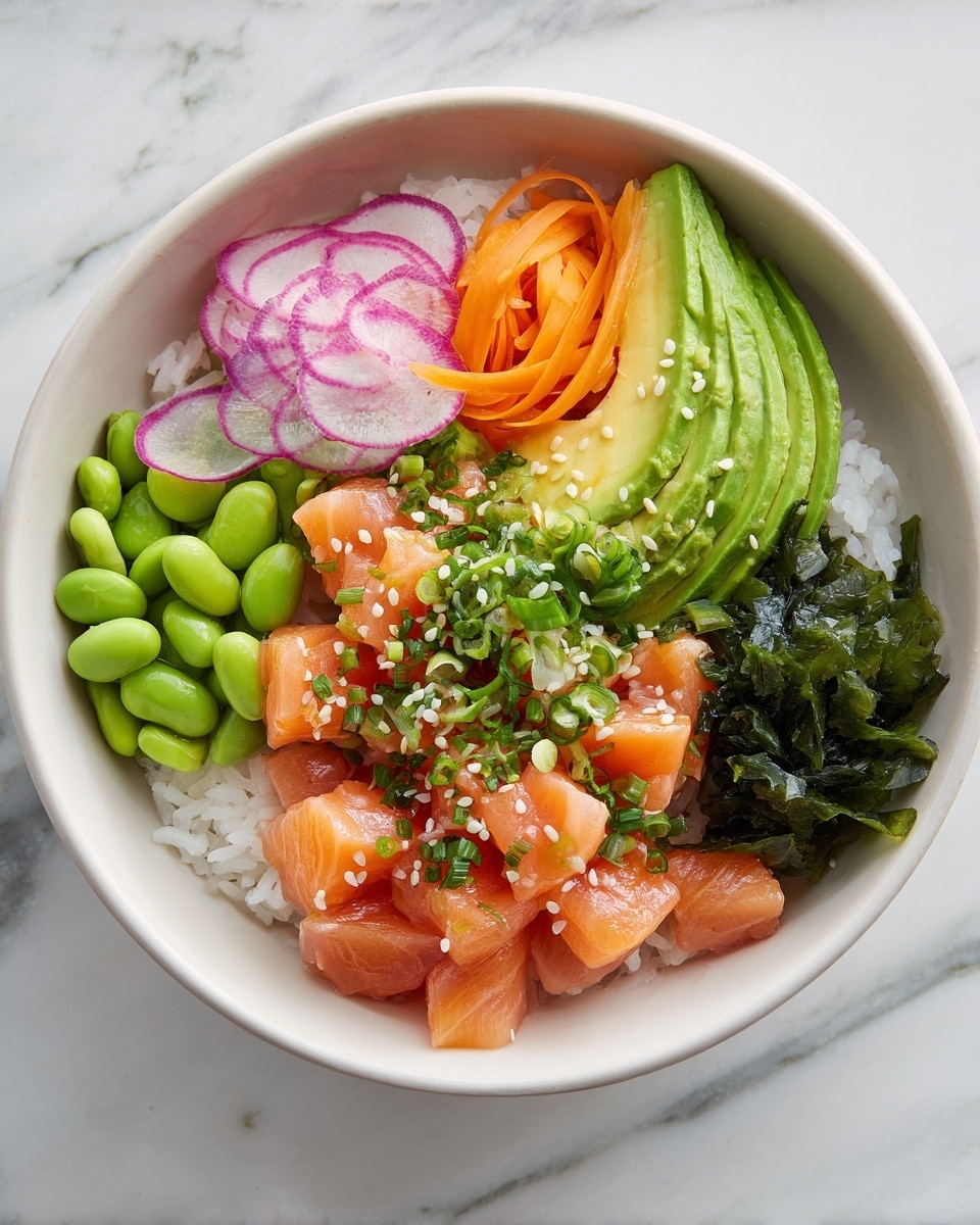 A white speckled bowl filled with five main layers arranged in sections: starting with a base of white rice covering half the bowl, followed by bright green edamame beans at the top, thin curls of orange carrot ribbons to the right, a fan of creamy green avocado slices sprinkled with white sesame seeds in the center, and scattered chunks of fresh raw salmon topped with chopped green onions and white sesame seeds on the lower right. There is also a section of dark green seaweed at the bottom left, with thin slices of purple-edged radish resting on top of the rice. The bowl sits on a white marbled surface. photo taken with an iphone --ar 4:5 --v 7