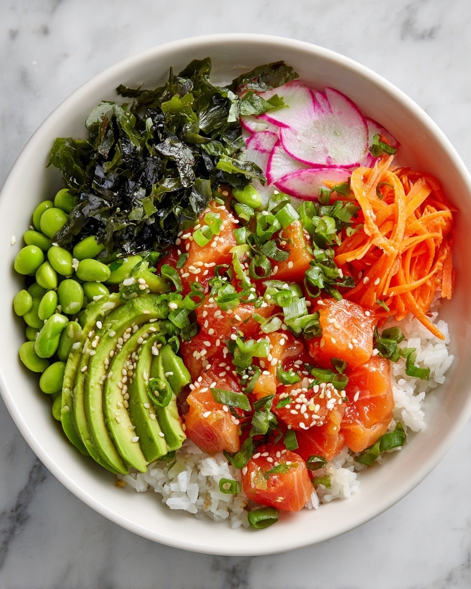 A white bowl filled with a layer of white rice at the base is topped with sections of bright green edamame beans, thin orange carrot ribbons, fresh diced pink-orange salmon pieces sprinkled with white sesame seeds and green chopped scallions, thinly sliced translucent radish with purple edges, a fan of smooth green avocado sprinkled with white sesame seeds, and dark green seaweed. The bowl sits on a white marbled surface. Photo taken with an iphone --ar 4:5 --v 7