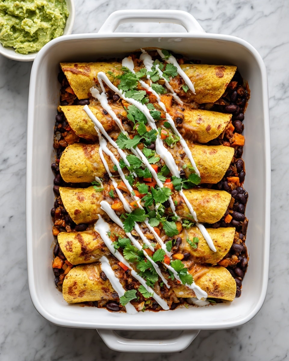 The image shows four rolled enchiladas placed side by side in a white baking dish. The enchiladas have a golden-yellow color with slightly charred spots and are filled with a mixture of black beans, orange sweet potato chunks, and other small vegetables. The dish is topped with scattered fresh green cilantro leaves and light drizzles of white sauce. The enchiladas rest on a bed of black beans and diced orange sweet potatoes that fill the dish around them. In the background, there is a small white bowl of creamy green guacamole on a white marbled surface with some cilantro leaves scattered nearby. photo taken with an iphone --ar 4:5 --v 7